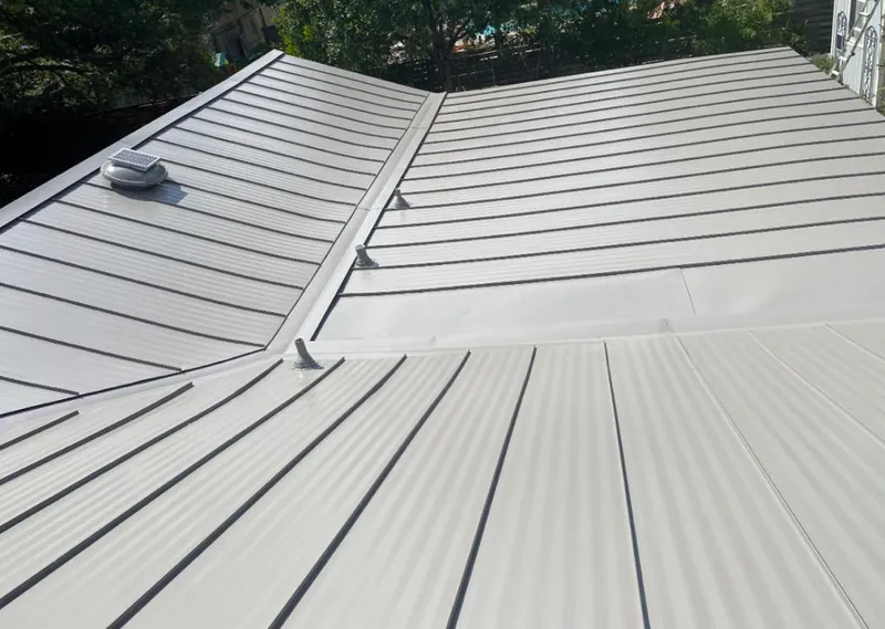 Solar attic fan installed on a metal roof for Roof Ventilation in Islamorada, Village of Islands